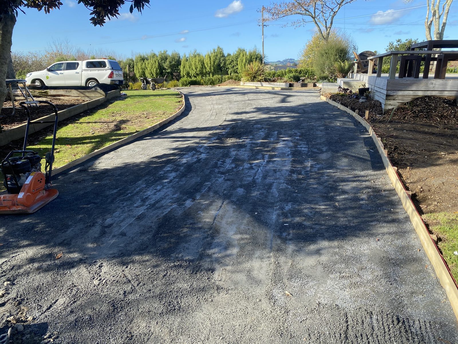Reinforced blockwork retaining wall under construction
